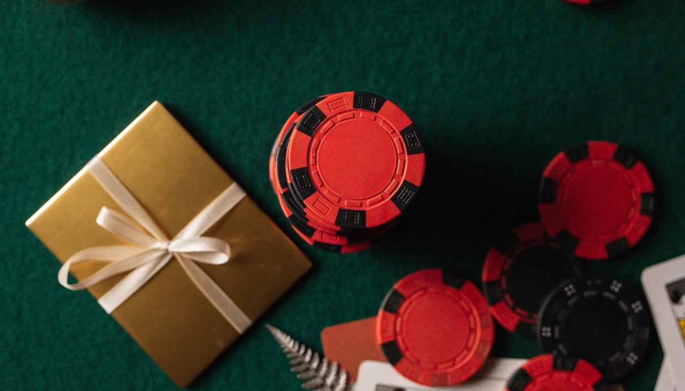 Prezzy gift card with casino chips and playing cards on green felt table